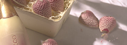 chocolate prosecco bottle and chocolate strawberries in basket