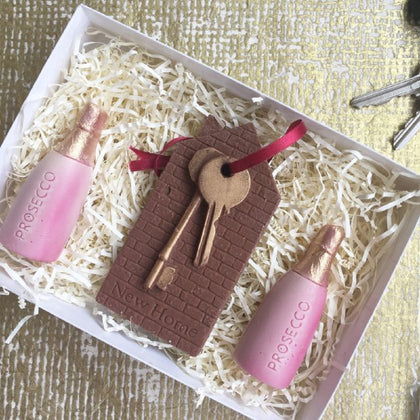 new home chocolate keys with chocolate prosecco bottle