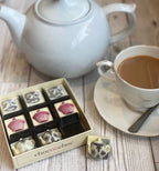 Chocolate Teapots, Tea Cups And Cakes