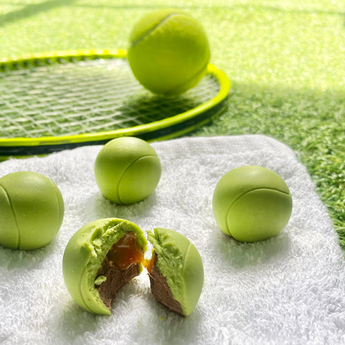 Nine Caramel Filled Chocolate Tennis Balls