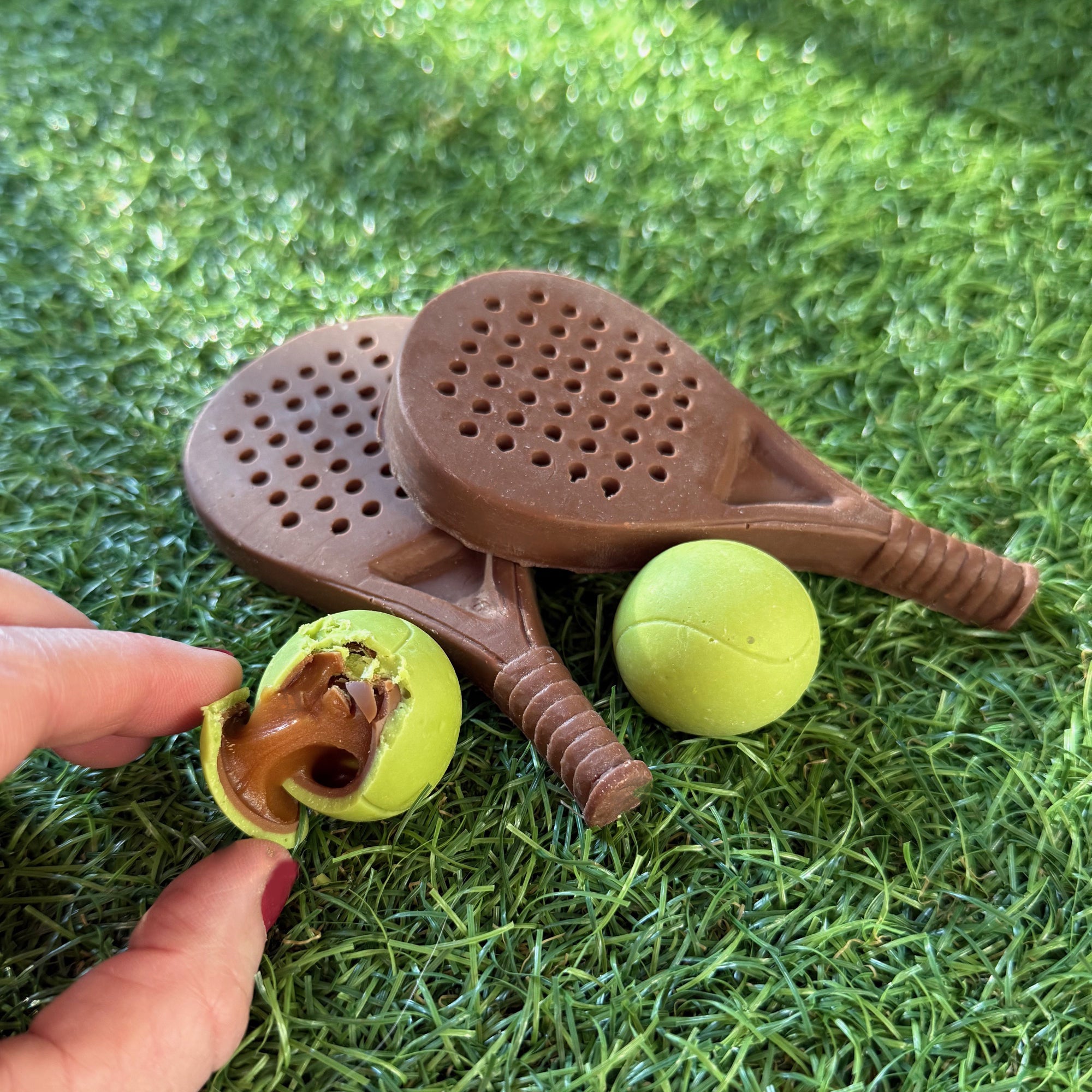 Chocolate Padel balls and Racket
